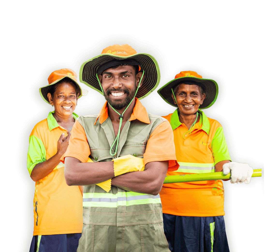 Cleaning staff standing together in CleanTech Lanka uniforms